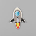 cartoon rocket embroidered stick-on patches in nine designs — retro kawaii and sci-fi styles