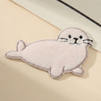 snow white harp seal fluffy embroidered patch close-up detail