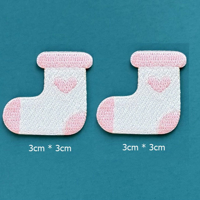white and pink heart stocking embroidered stick-on patches — pair of white stockings with pink heart motif and white cuff and toe 30x30mm