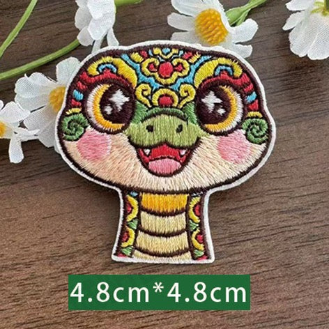 Chinese zodiac snake embroidered stick-on patch — slender vertical silhouette small smiling face coiled body opera style