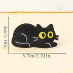 lying down flat black cat embroidered stick-on patch — chin on ground