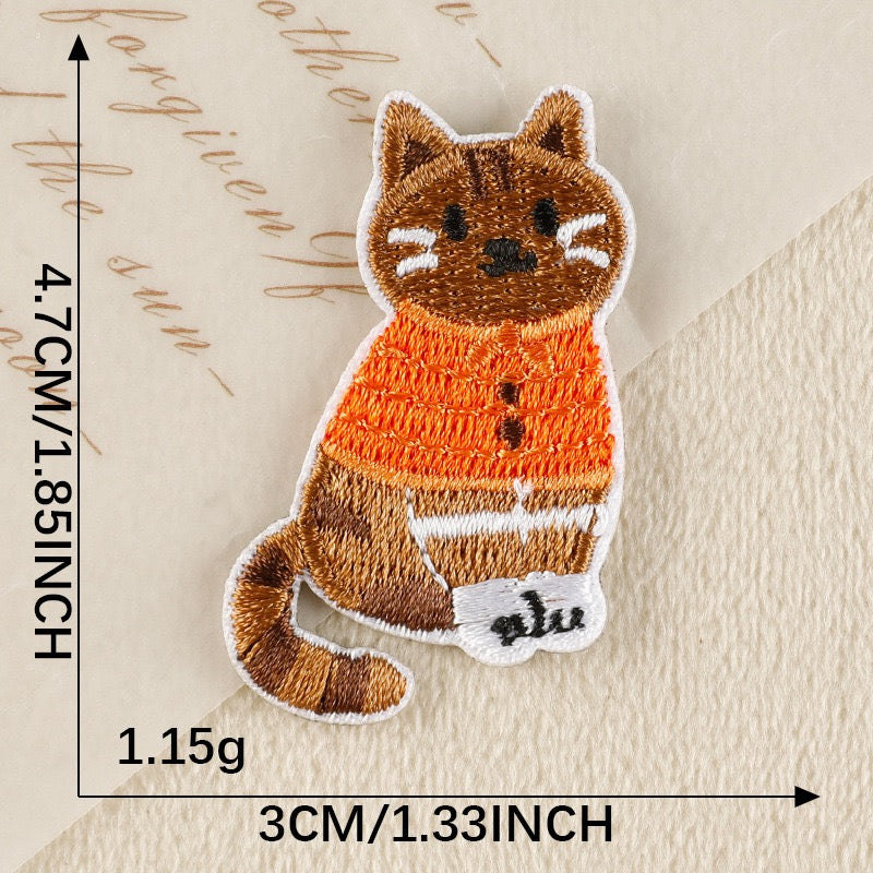 studious ginger tabby in knitted cardigan whimsical embroidered stick-on patch