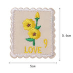 yellow daisy love floral postage stamp embroidered stick-on patch