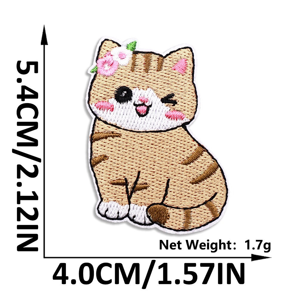 winking ginger tabby with flower hairclip embroidered patch