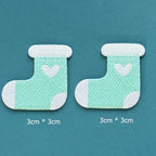 mint green heart stocking embroidered stick-on patches — pair of soft mint green stockings with white cuff white heart and white toe 30x30mm