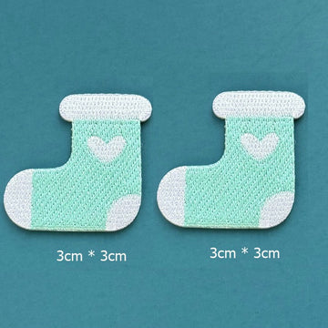 mint green heart stocking embroidered stick-on patches — pair of soft mint green stockings with white cuff white heart and white toe 30x30mm