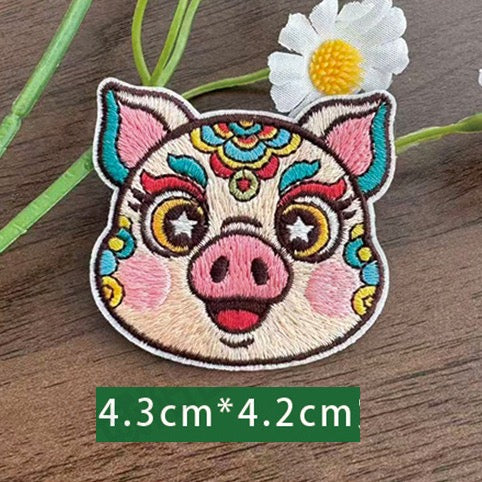 Chinese zodiac pig embroidered stick-on patch — round nose pink ears content expression opera face-paint style