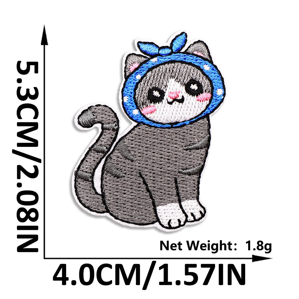 grey cat in blue polka dot hood embroidered patch