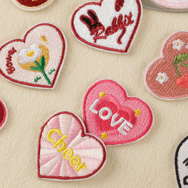 Y2K lettering heart embroidered stick-on patches — eight designs including LOVE BRAVE FREE HELLO Night Day CHEER LOVER and MOOD bold retro heart patches 36x33mm