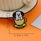 black ears dog in yellow patterned cup embroidered stick-on patch