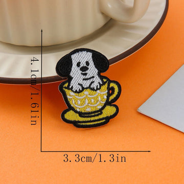 black ears dog in yellow patterned cup embroidered stick-on patch