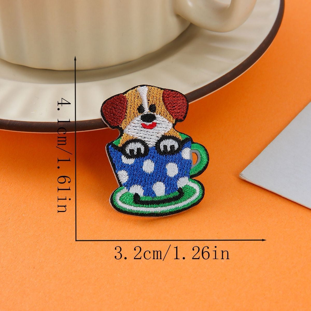 spotted dog in blue polka dot cup embroidered stick-on patch