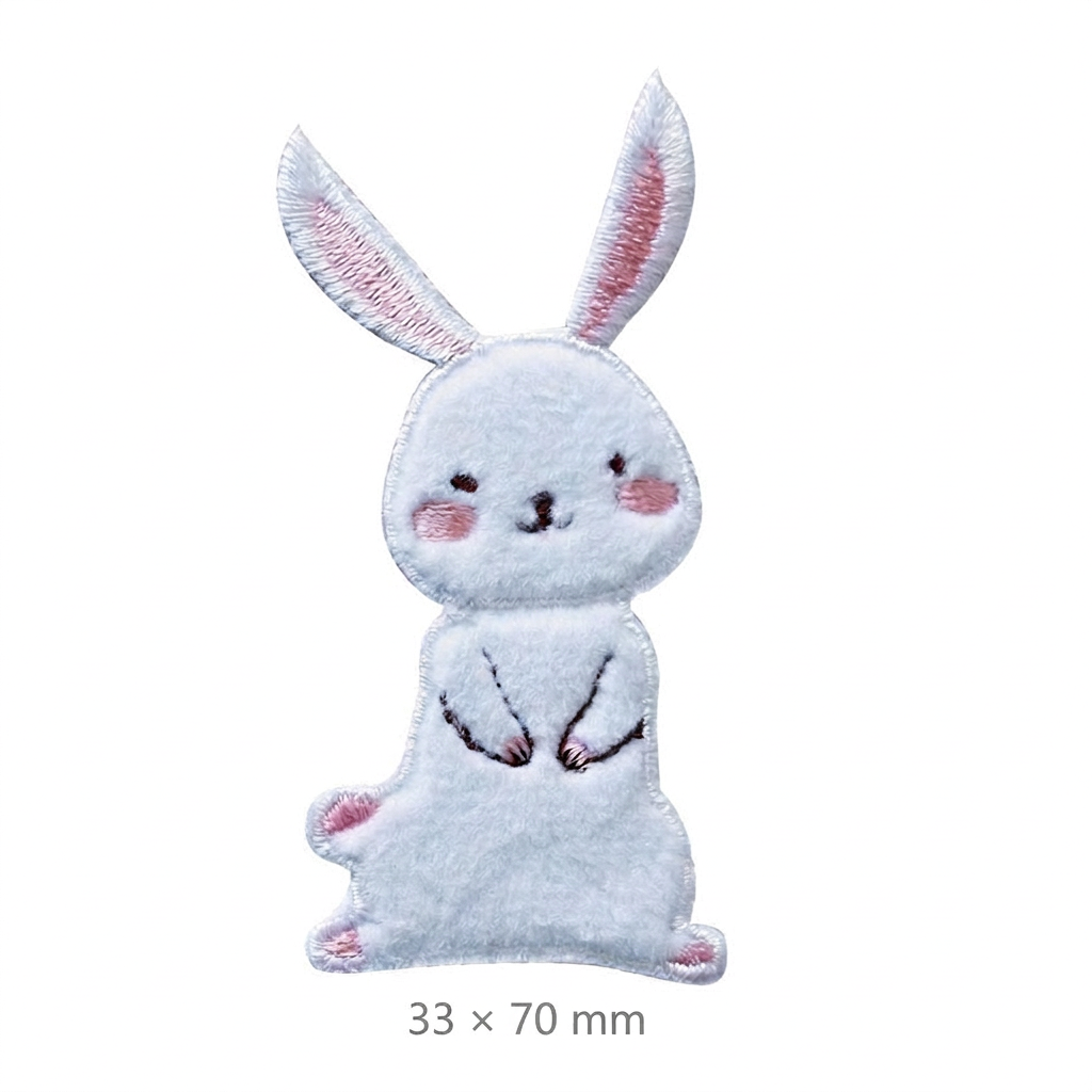 Large furry white bunny embroidered stick-on patch measuring 33 × 70 mm
