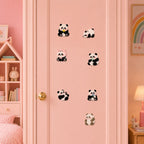 cute panda holding daisy with pink bow ears fluffy texture and raised paw stick-on patches scattered on a pink closet door in a pastel room