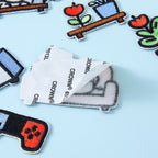 cozy dog daily life embroidered stick-on patch showing peel-and-stick adhesive backing