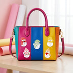 five cute winter snowman patches in different colored hats decorating a rainbow stripe tote bag