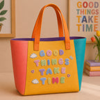 pastel macaroon mini alphabet embroidered patches spelling good things take time on a color-block leather tote bag