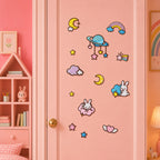kawaii saturn with heart star dangles moon cloud rainbow shooting star winged heart and bunny on pink cloud stick-on patches on a pink door in a girls room