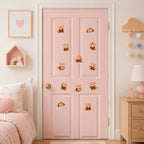 twelve adorable red panda embroidered patches in various poses scattered on a pink door in a pastel girls bedroom