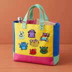 spooky cute halloween ghost embroidered stick-on patch on tote bag