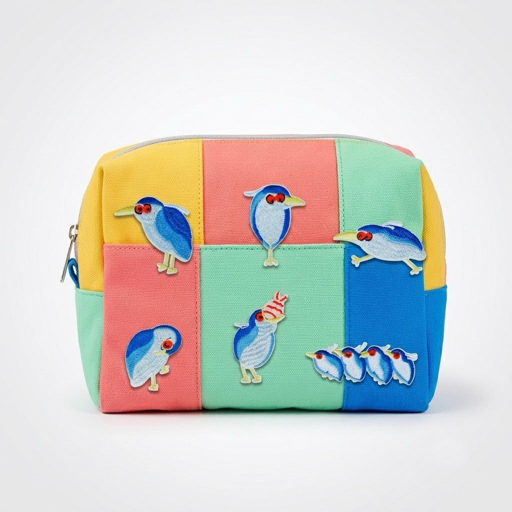 black-crowned night heron embroidered stick-on patch on makeup pouch