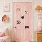 realistic cocker spaniel bulldog poodle mix golden retriever and border collie dog face stick-on patches scattered on a pink door in a girls room