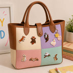 fox rabbit owl and bird wilderness stick-on patches decorating a soft color-block leather handbag
