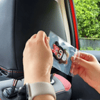 animated texture touch and peel and stick demo of fuzzy chenille penguin embroidered patch applied to car headrest
