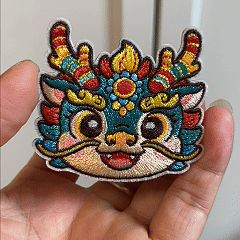 animated hand holding packaged chinese zodiac animal embroidered patches showing multiple zodiac styles and detailed embroidery texture