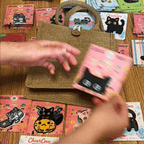 peel and stick application demo of peeking cat embroidered patch