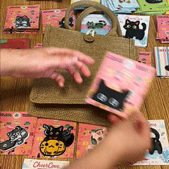 peel and stick application demo of peeking cat embroidered patch