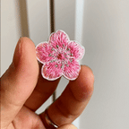  Animated display of colorful cherry blossom embroidered stick-on patches